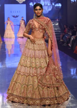 Rose Pink Junoesque Bridal Lehenga In Raw Silk With Heavy Embroidery - NOOR 2022