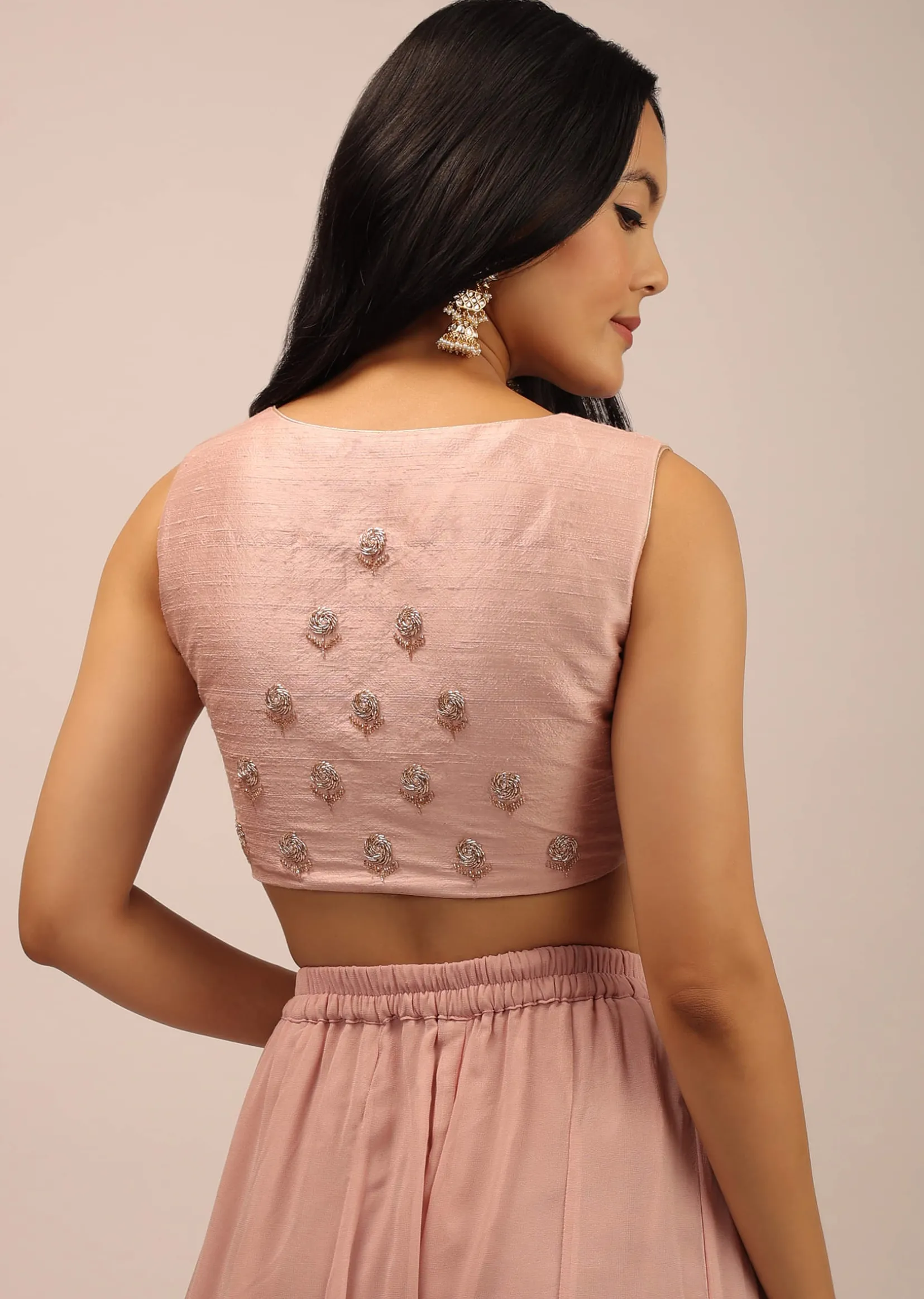 Rose Pink Padded Blouse With Overlapping Design Adorned In zardosi Work In Floral Pattern