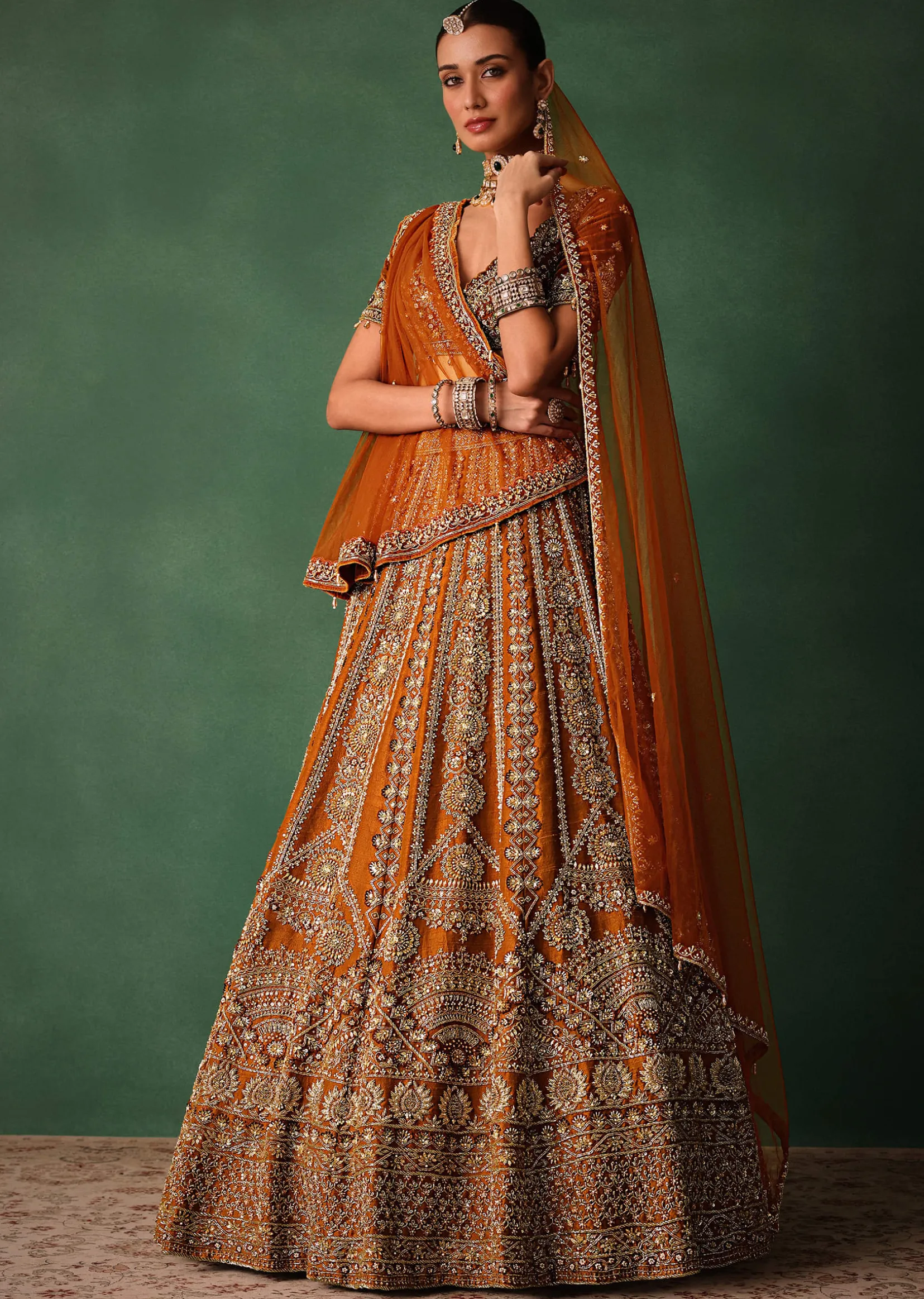 Rust Embroidered Bridal Lehenga With Deep Neckline Blouse And Dupatta
