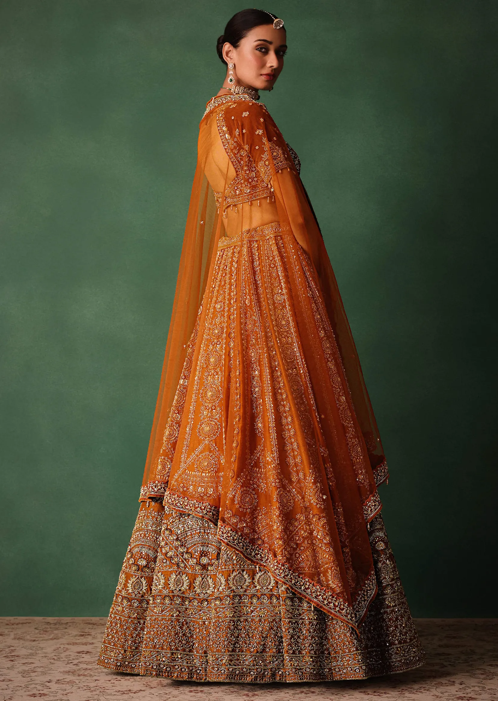Rust Embroidered Bridal Lehenga With Deep Neckline Blouse And Dupatta