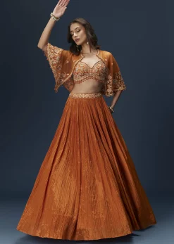 Rust Orange Embroidered Lehenga With Dramatic Cape And Blouse