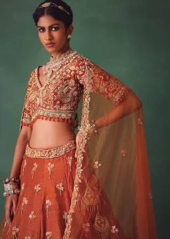 Rust Raw Silk Bridal Kali Lehenga With Embroidered Blouse And Dupatta