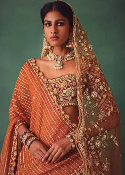 Rust Raw Silk Bridal Lehenga With Buti Work Dupatta