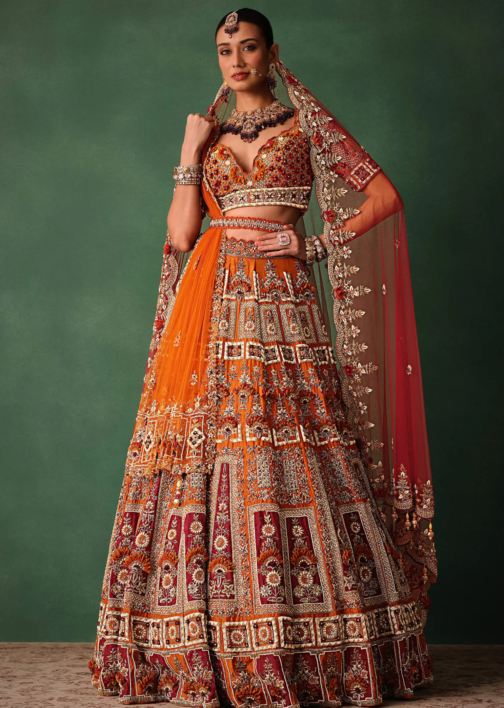 Rust Red Hand Work Bridal Lehenga With Deep Neckline Blouse And Dupatta