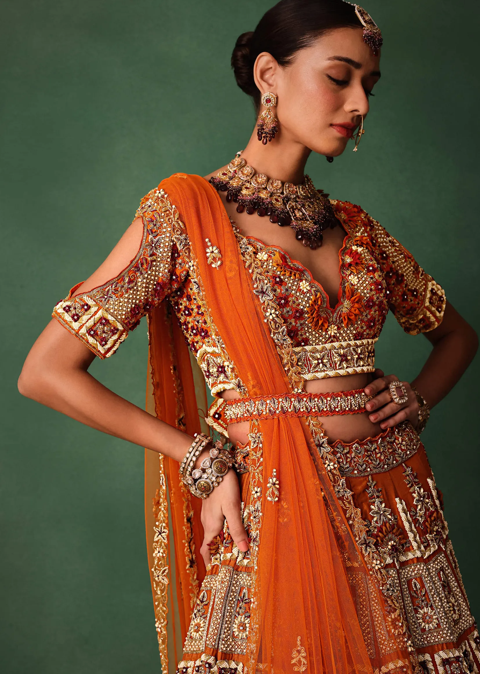 Rust Red Hand Work Bridal Lehenga With Deep Neckline Blouse And Dupatta