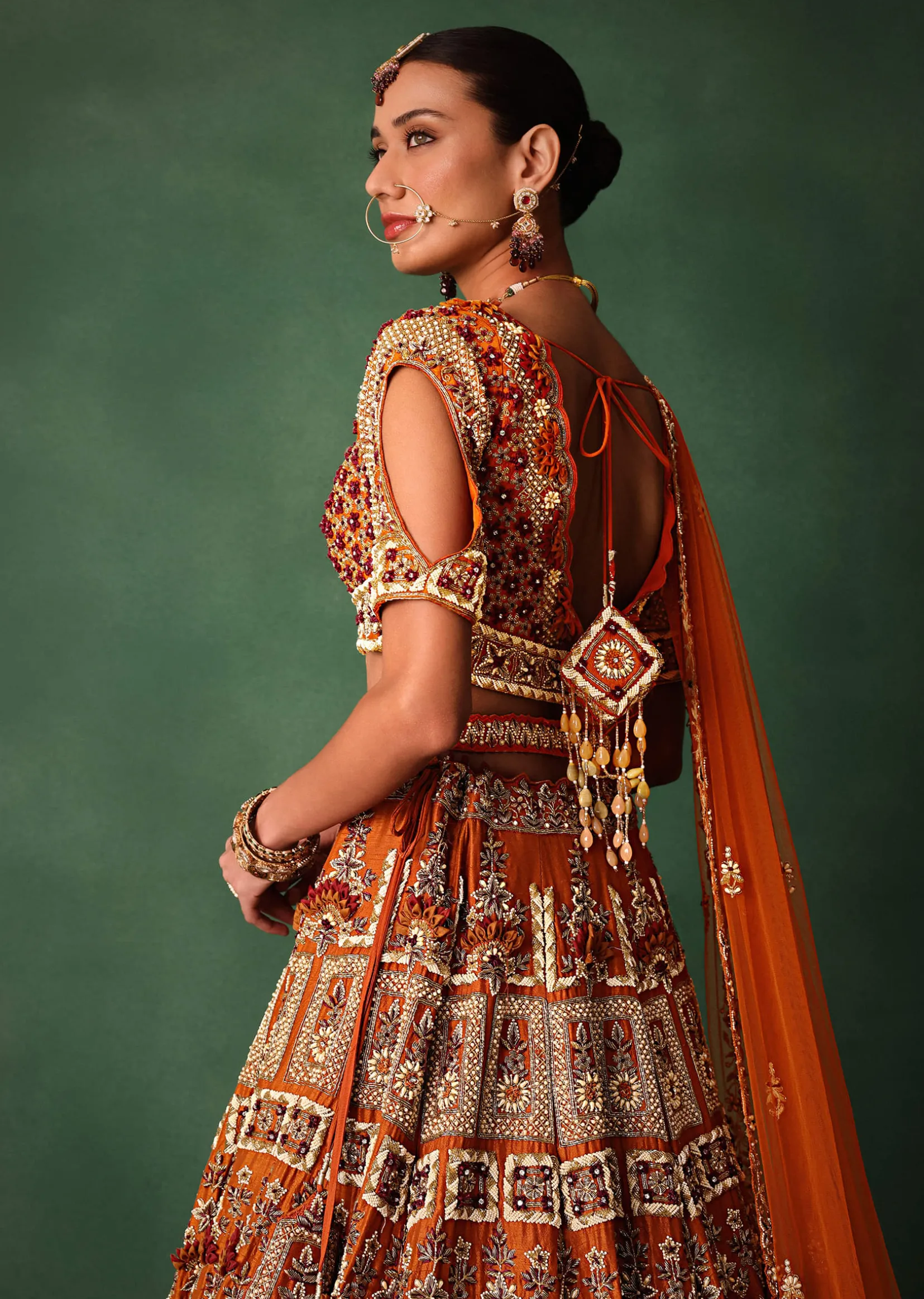 Rust Red Hand Work Bridal Lehenga With Deep Neckline Blouse And Dupatta