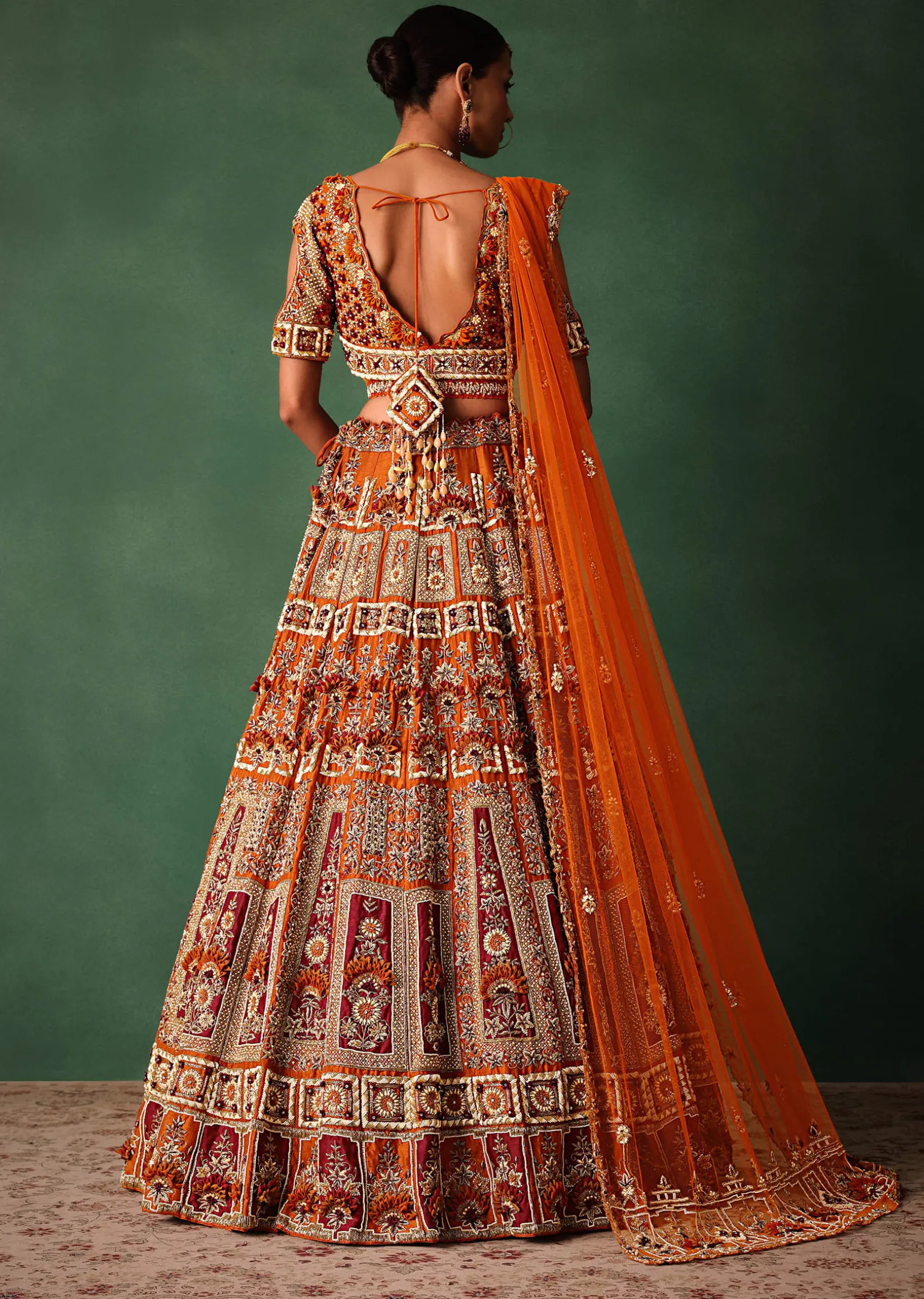 Rust Red Hand Work Bridal Lehenga With Deep Neckline Blouse And Dupatta