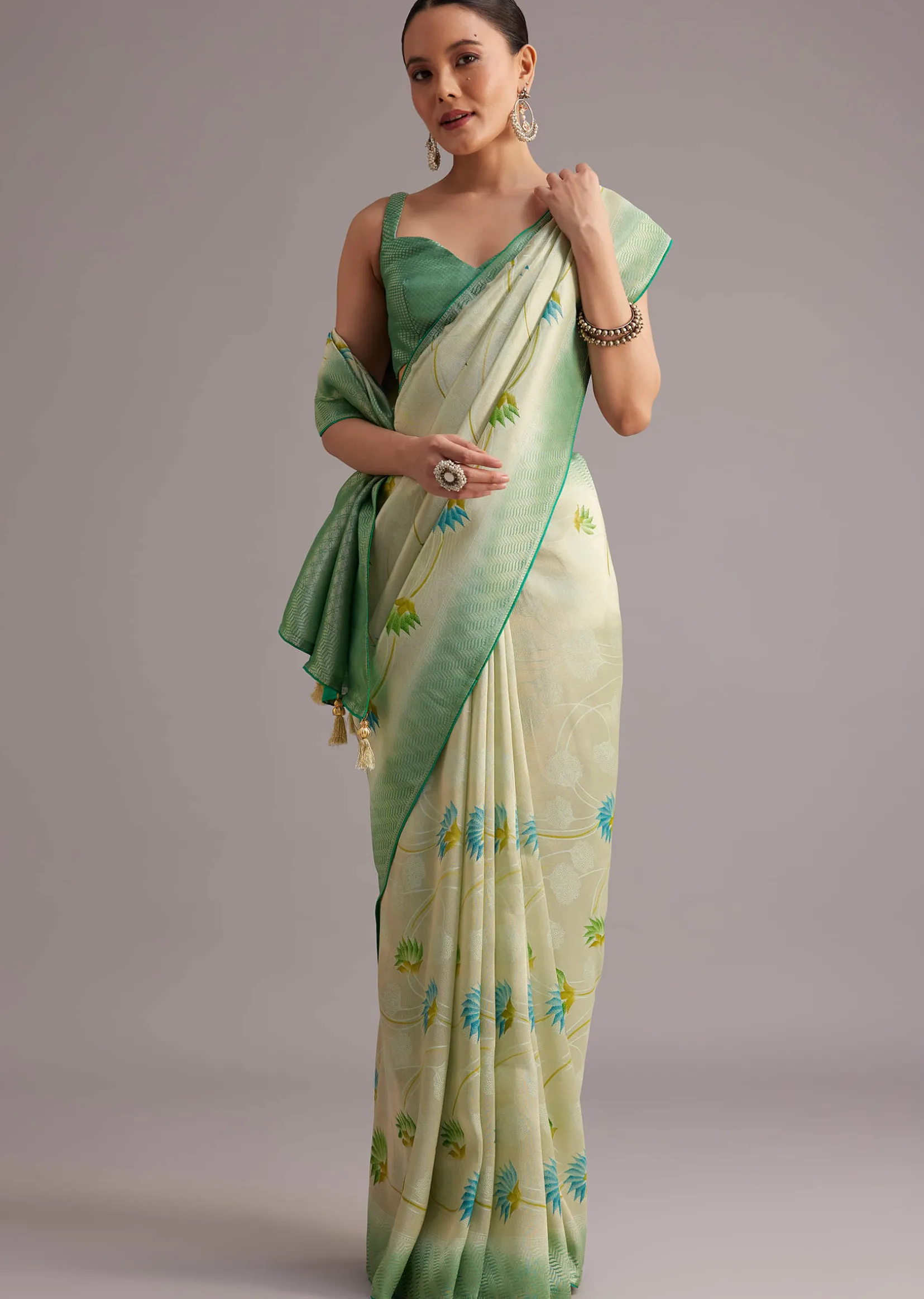 Sea Green Tissue Silk Floral Motif Saree With Contrast Pallu And Border