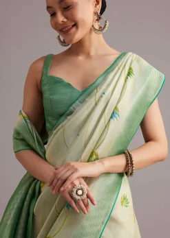 Sea Green Tissue Silk Floral Motif Saree With Contrast Pallu And Border
