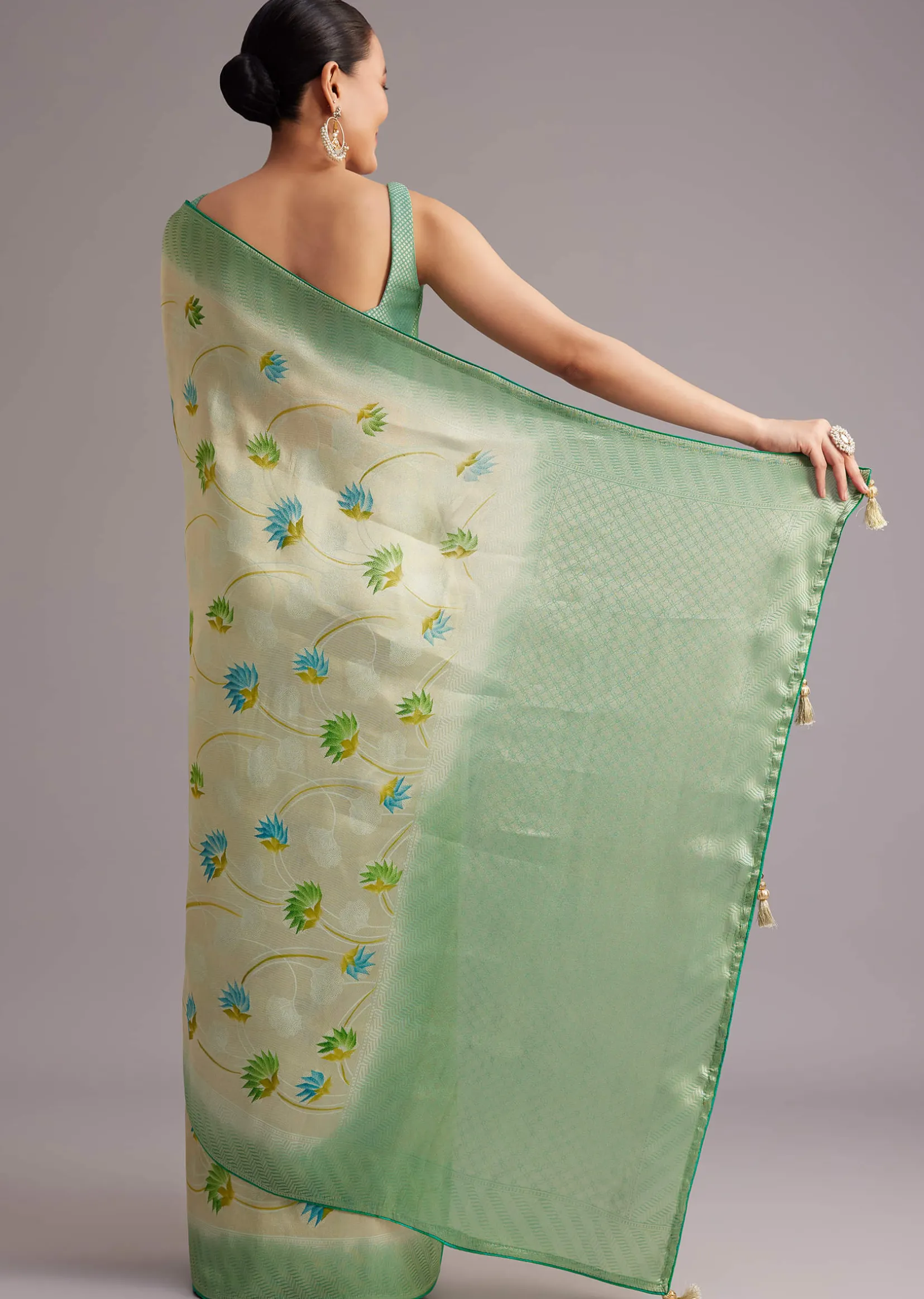 Sea Green Tissue Silk Floral Motif Saree With Contrast Pallu And Border