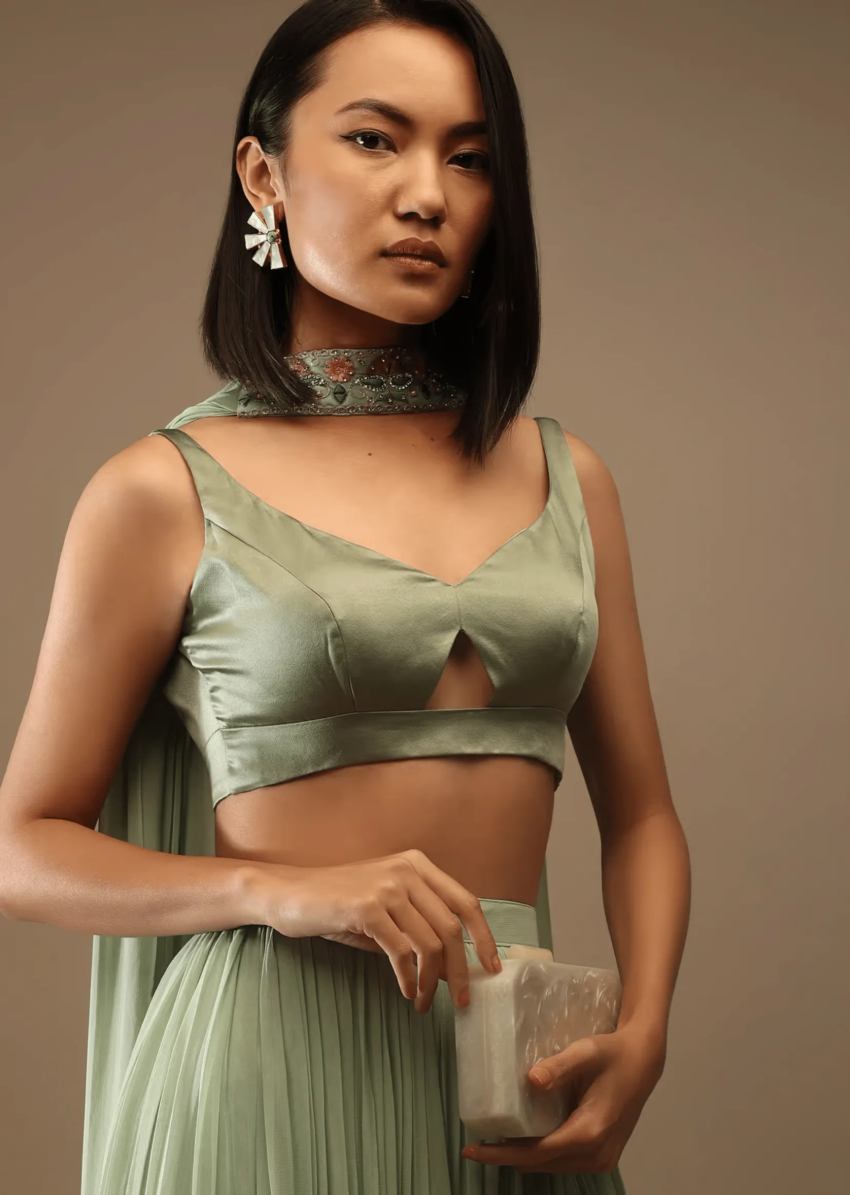 Seaspray Sleeveless Blouse With A Triangle Cut Out At The Bottom Back Tie-Up And Hooks Closure