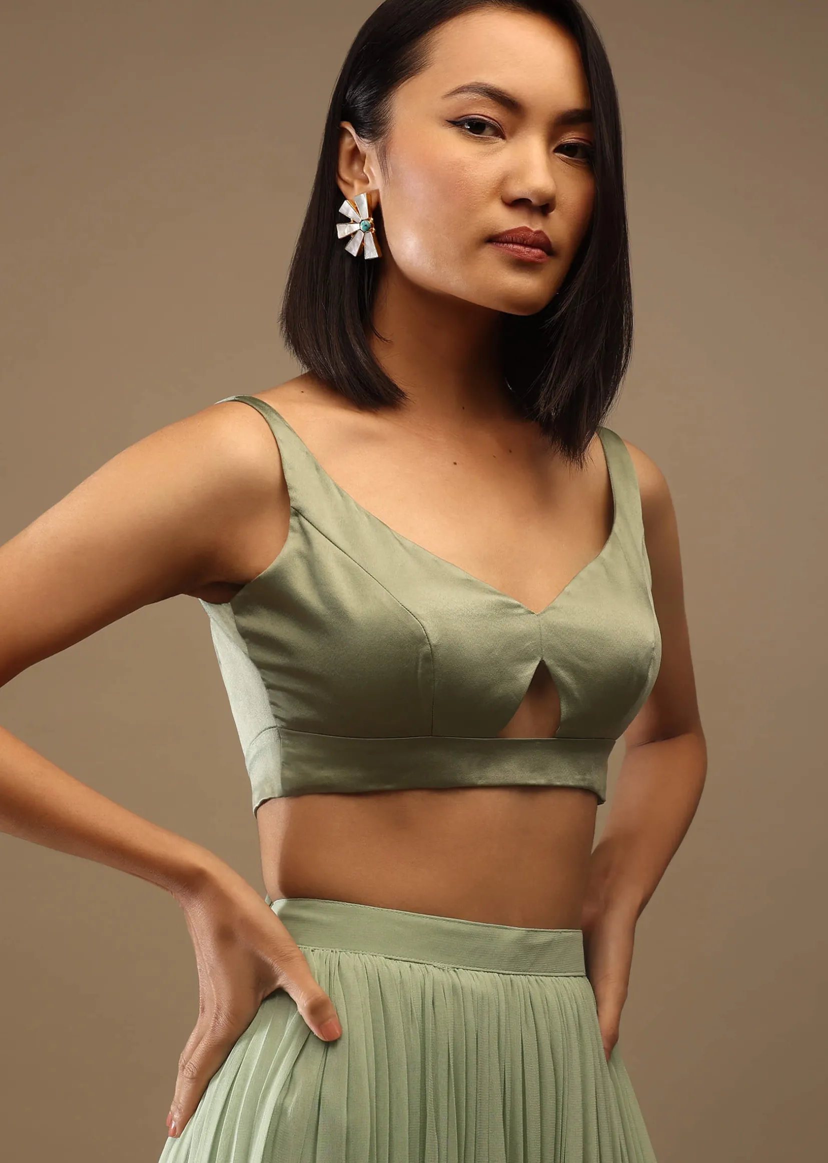 Seaspray Sleeveless Blouse With A Triangle Cut Out At The Bottom Back Tie-Up And Hooks Closure