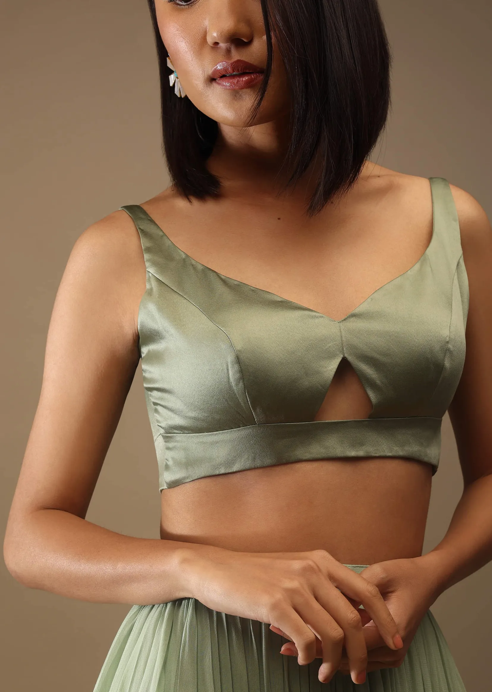 Seaspray Sleeveless Blouse With A Triangle Cut Out At The Bottom Back Tie-Up And Hooks Closure
