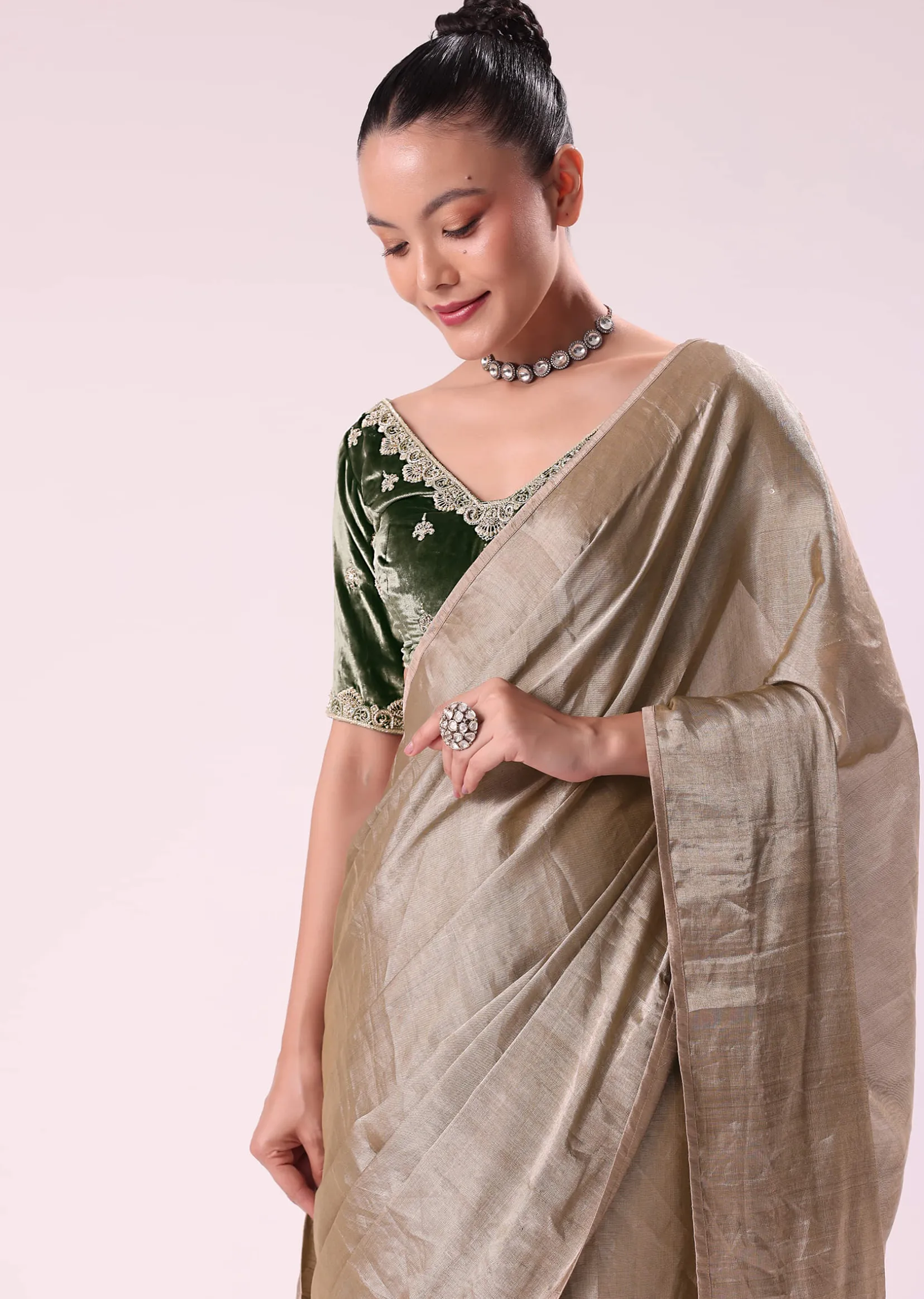 Silver Zari Tissue Saree With Embroidered Emerald Green Stitched Blouse