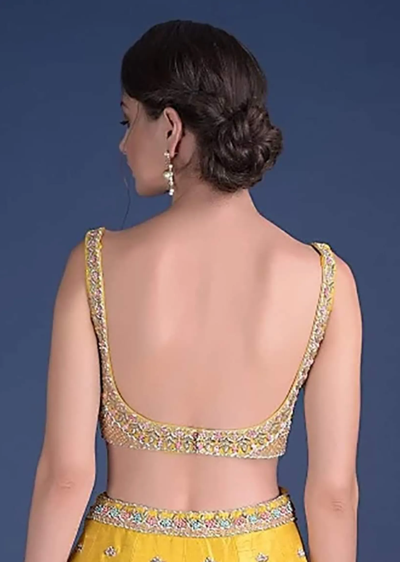 Sunset Yellow Blouse With Heavy Embossed Embroidery In Floral Butti Design