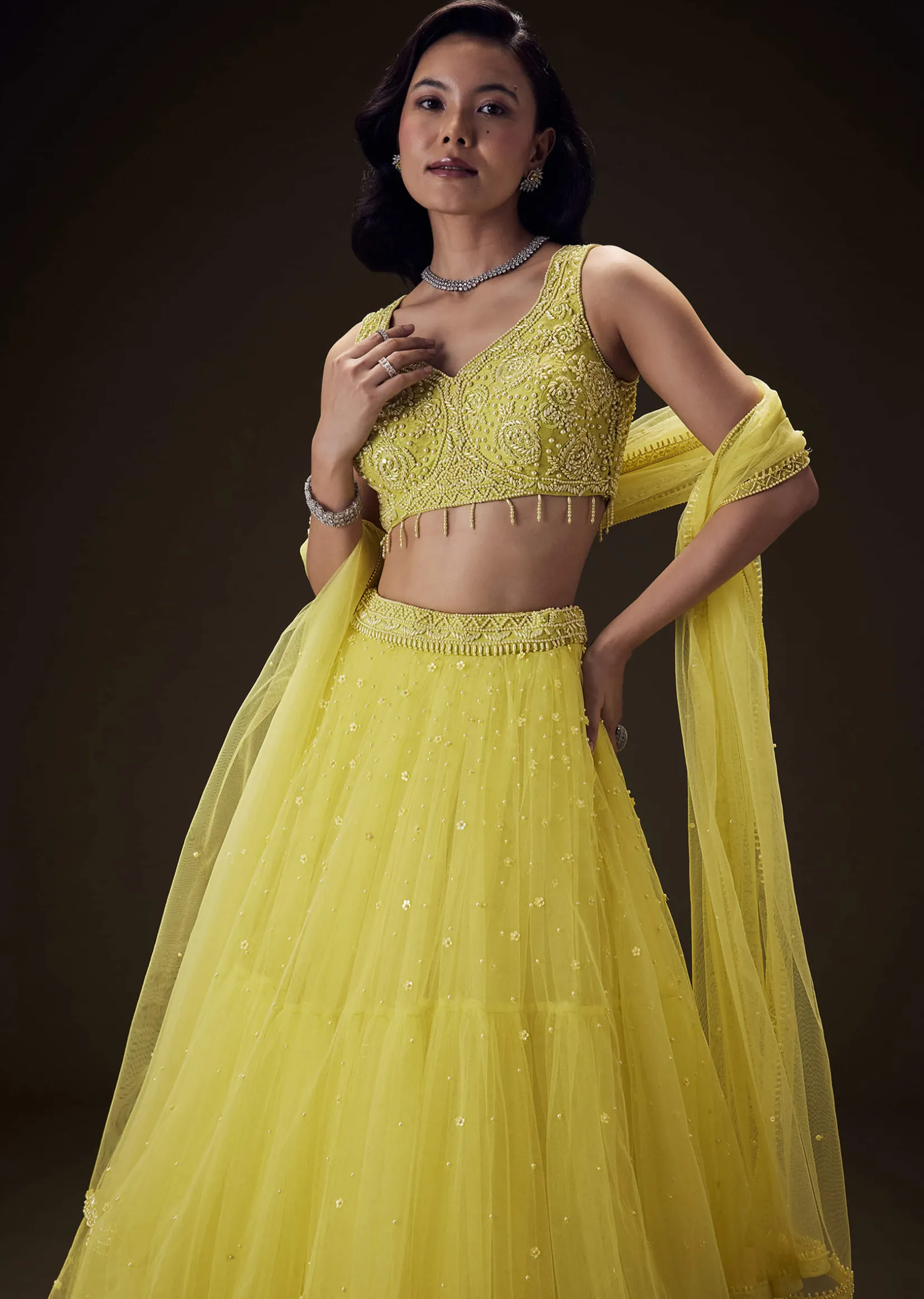 Sunshine Yellow Net Hand Embroided Pearl Work Lehenga Set