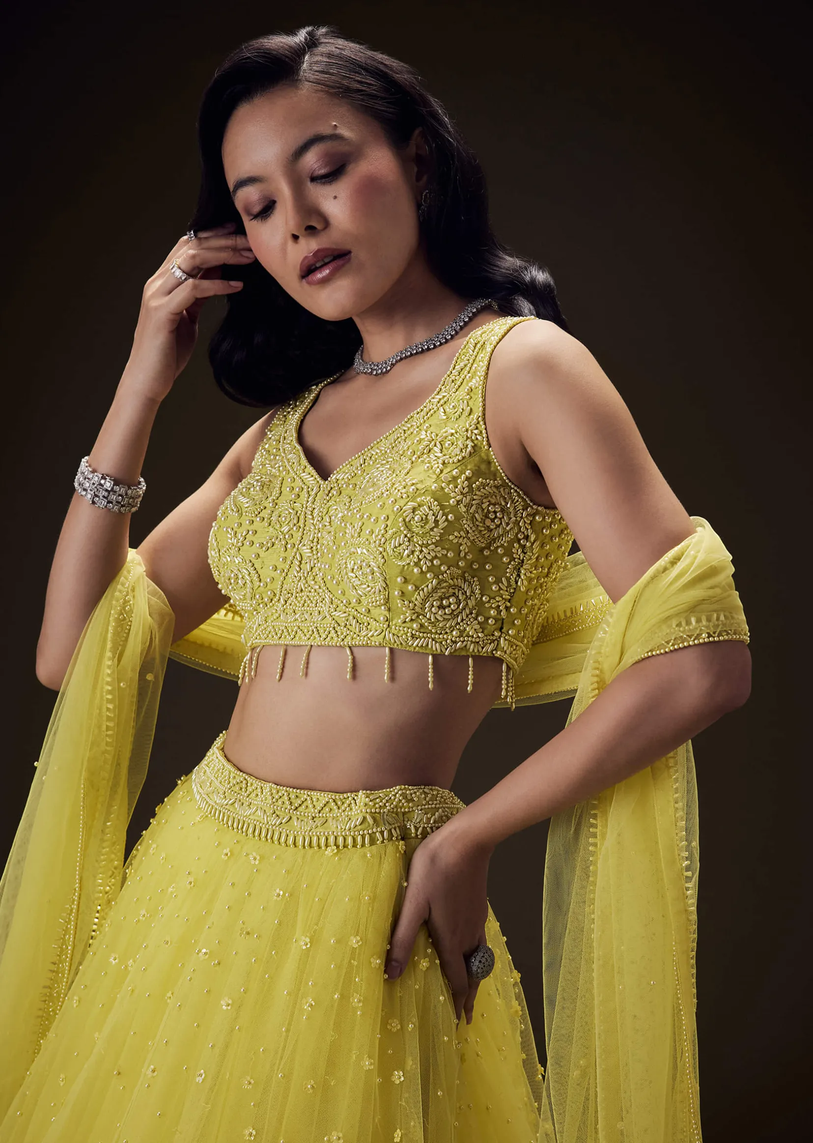 Sunshine Yellow Net Hand Embroided Pearl Work Lehenga Set
