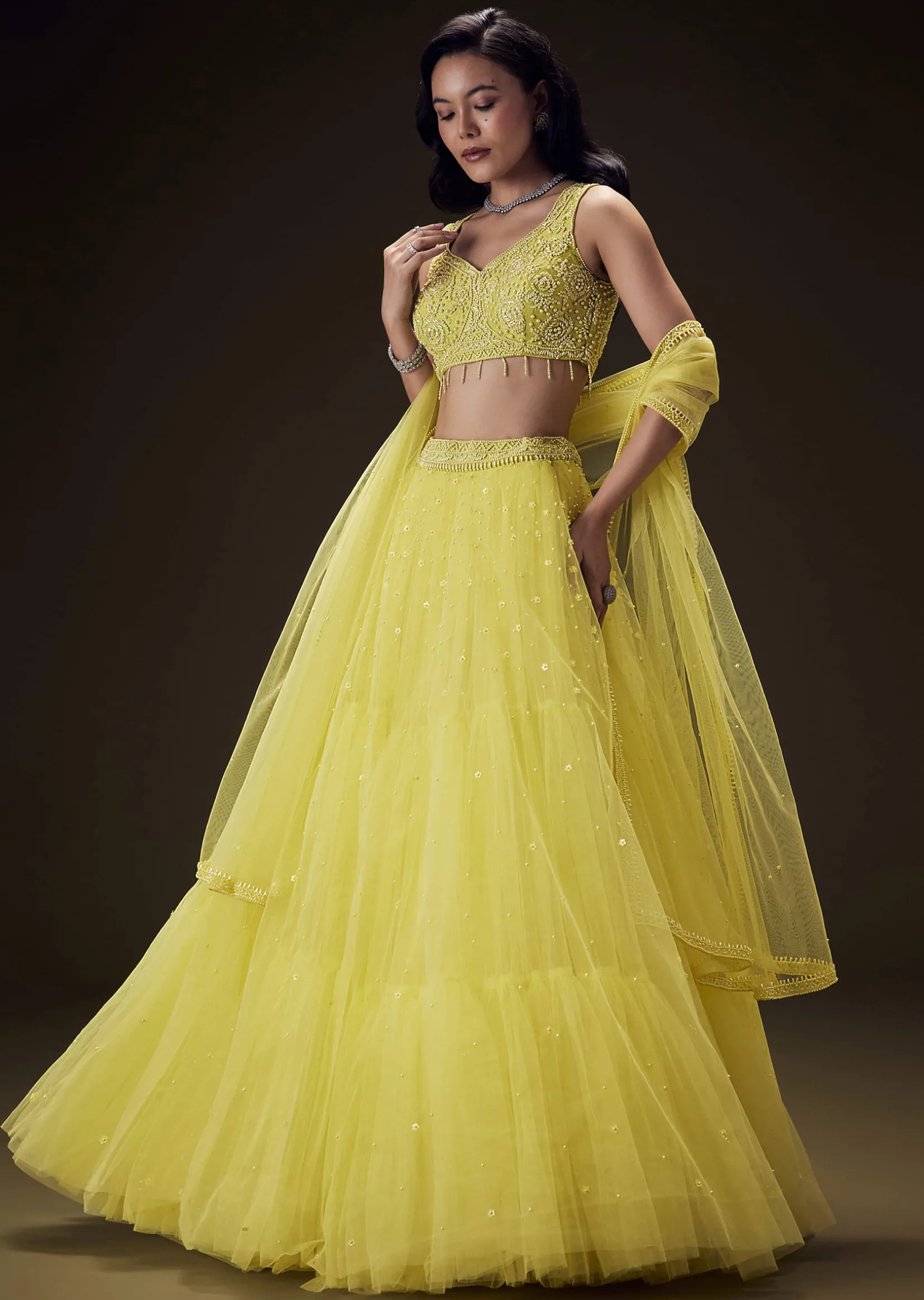 Sunshine Yellow Net Hand Embroided Pearl Work Lehenga Set