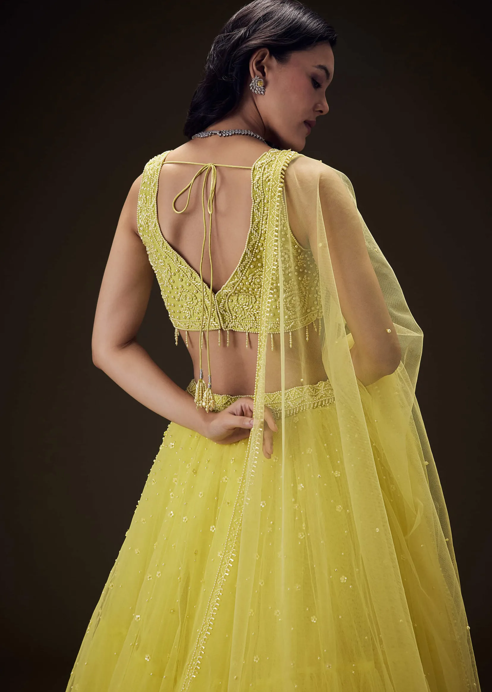 Sunshine Yellow Net Hand Embroided Pearl Work Lehenga Set