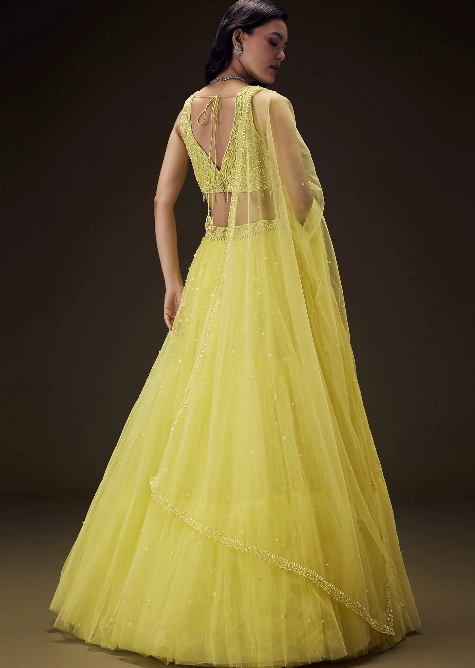 Sunshine Yellow Net Hand Embroided Pearl Work Lehenga Set