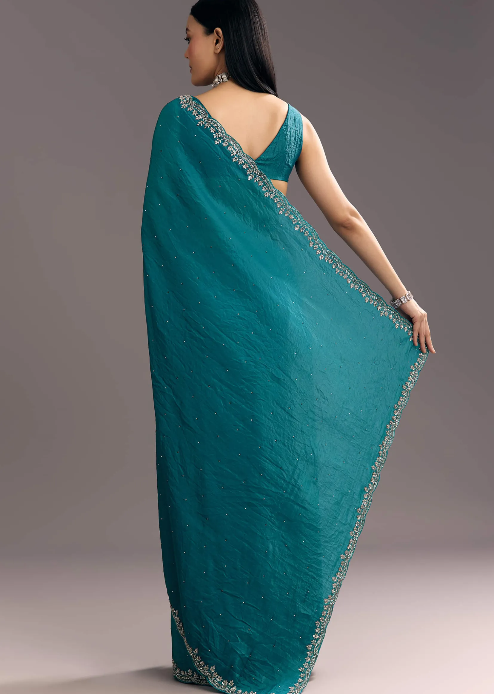 Teal Blue Crushed Tissue Stone Embellished Saree With Cutdana Scallop Border