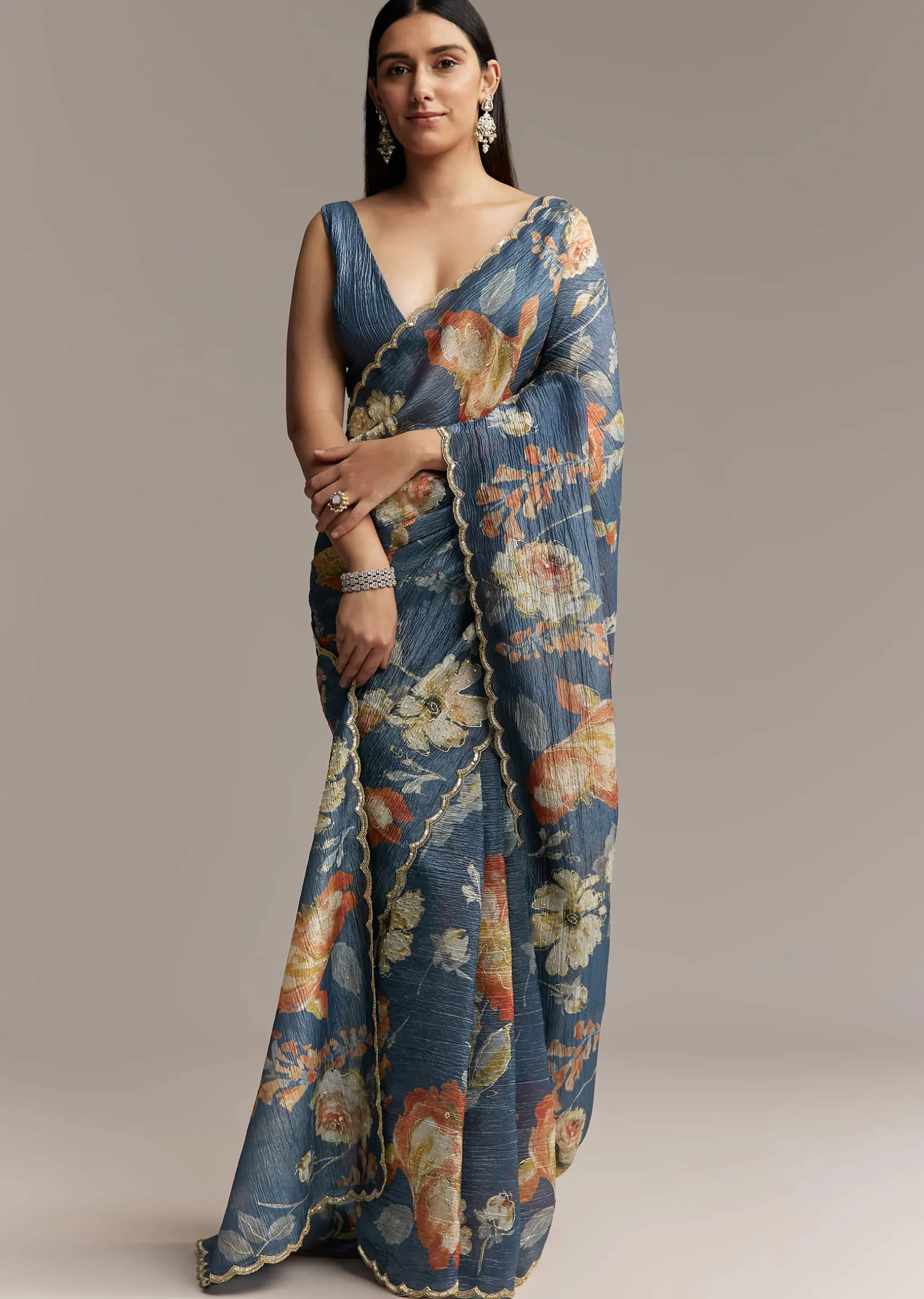 Teal Blue Tissue Saree With Floral Print And Embroidered Border