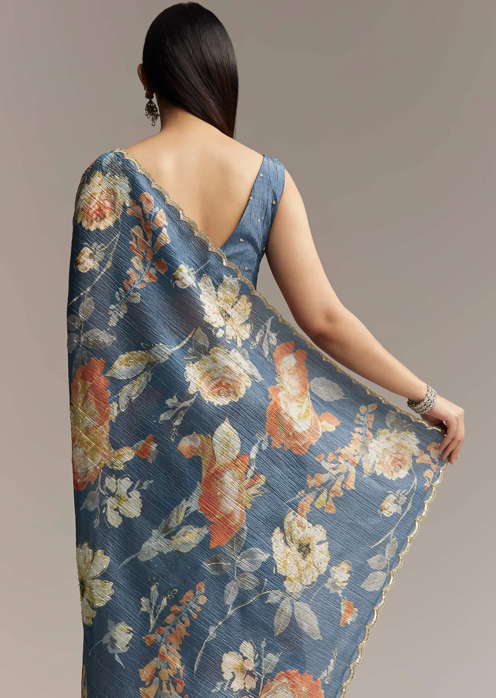 Teal Blue Tissue Saree With Floral Print And Embroidered Border