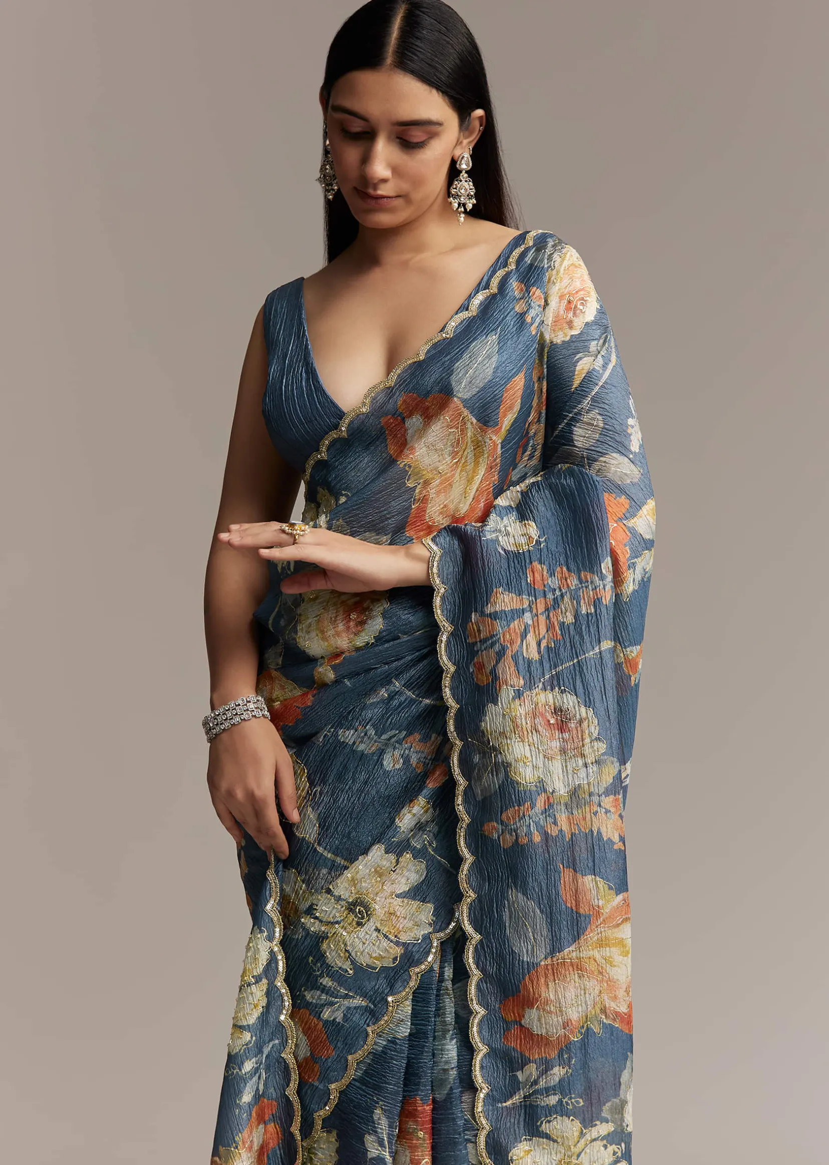 Teal Blue Tissue Saree With Floral Print And Embroidered Border