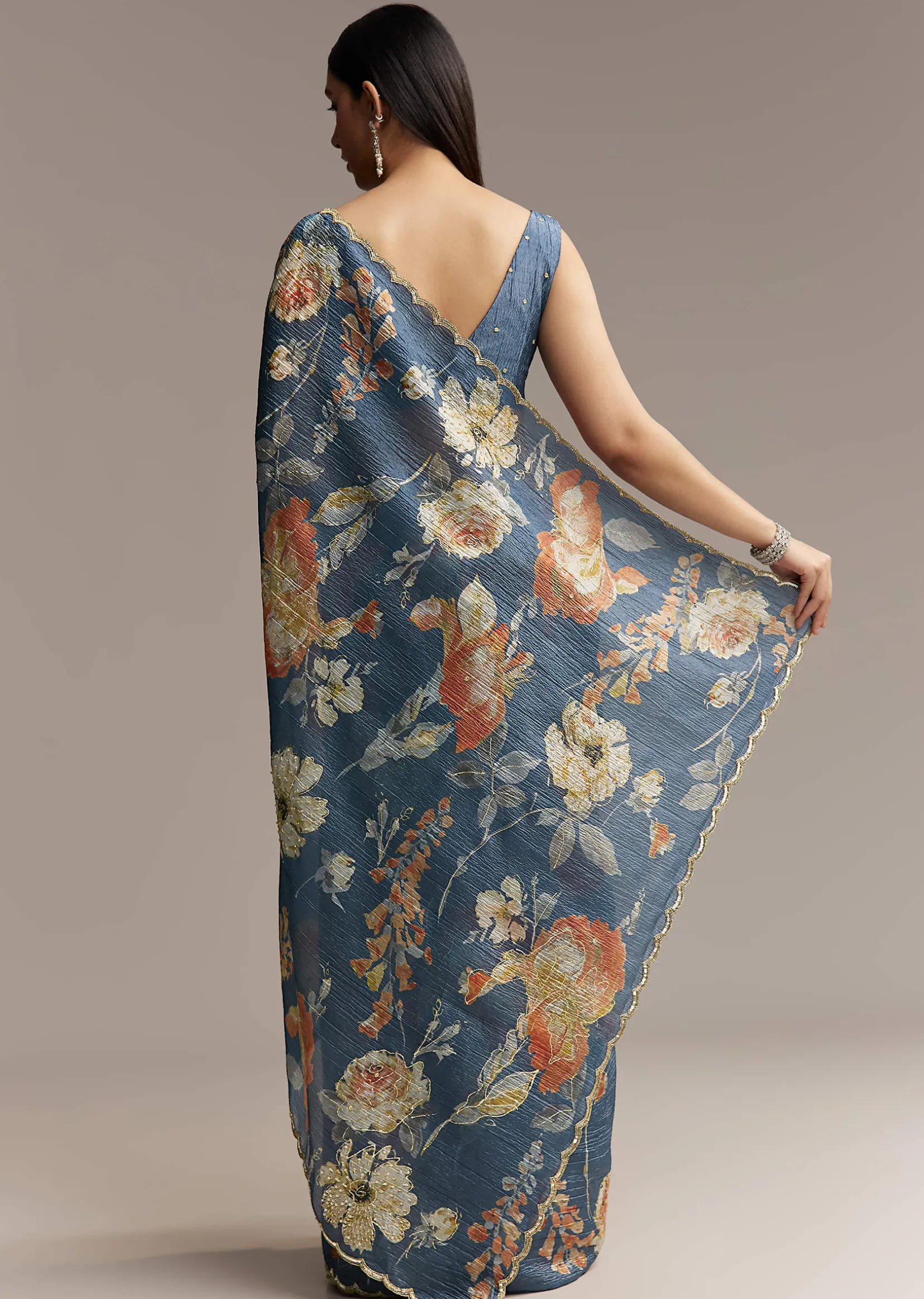 Teal Blue Tissue Saree With Floral Print And Embroidered Border