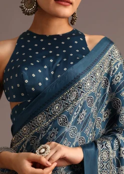 Teal Satin Ajrakh Print Saree With Mirror Embellished Border And Pallu