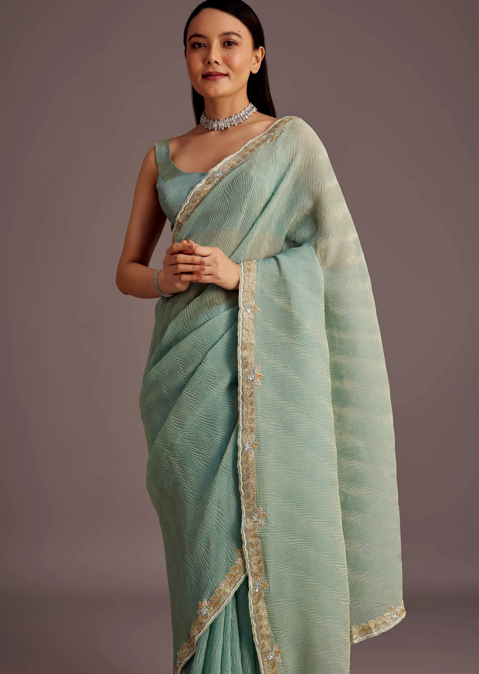 Turquoise Blue Crush Tissue Cutdana Work Saree With Embroidered Border