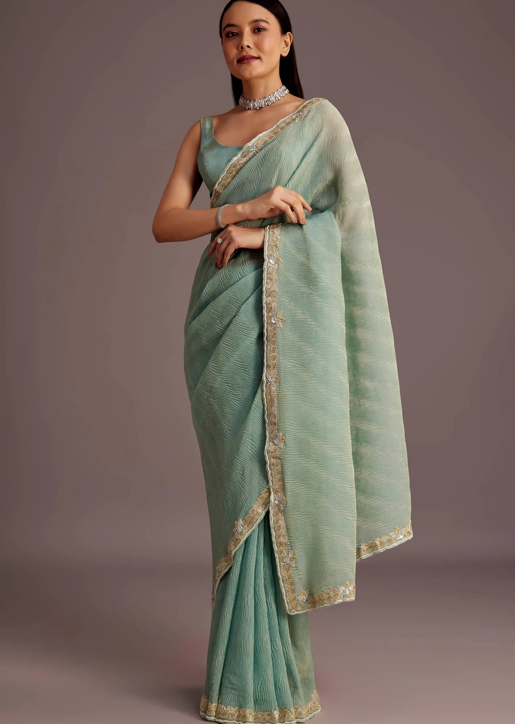 Turquoise Blue Crush Tissue Cutdana Work Saree With Embroidered Border