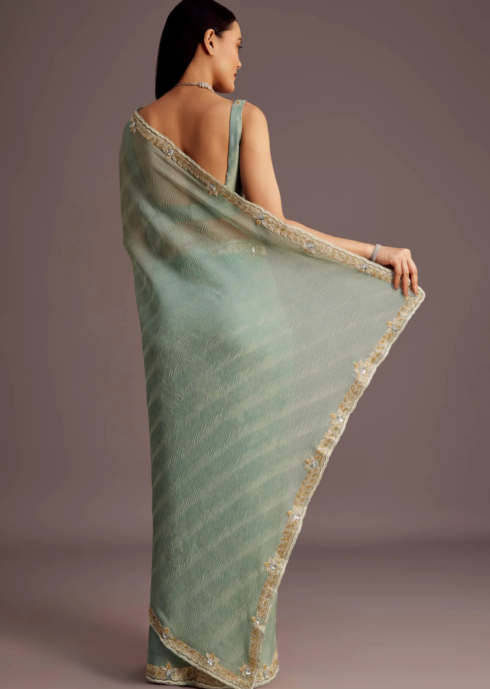 Turquoise Blue Crush Tissue Cutdana Work Saree With Embroidered Border