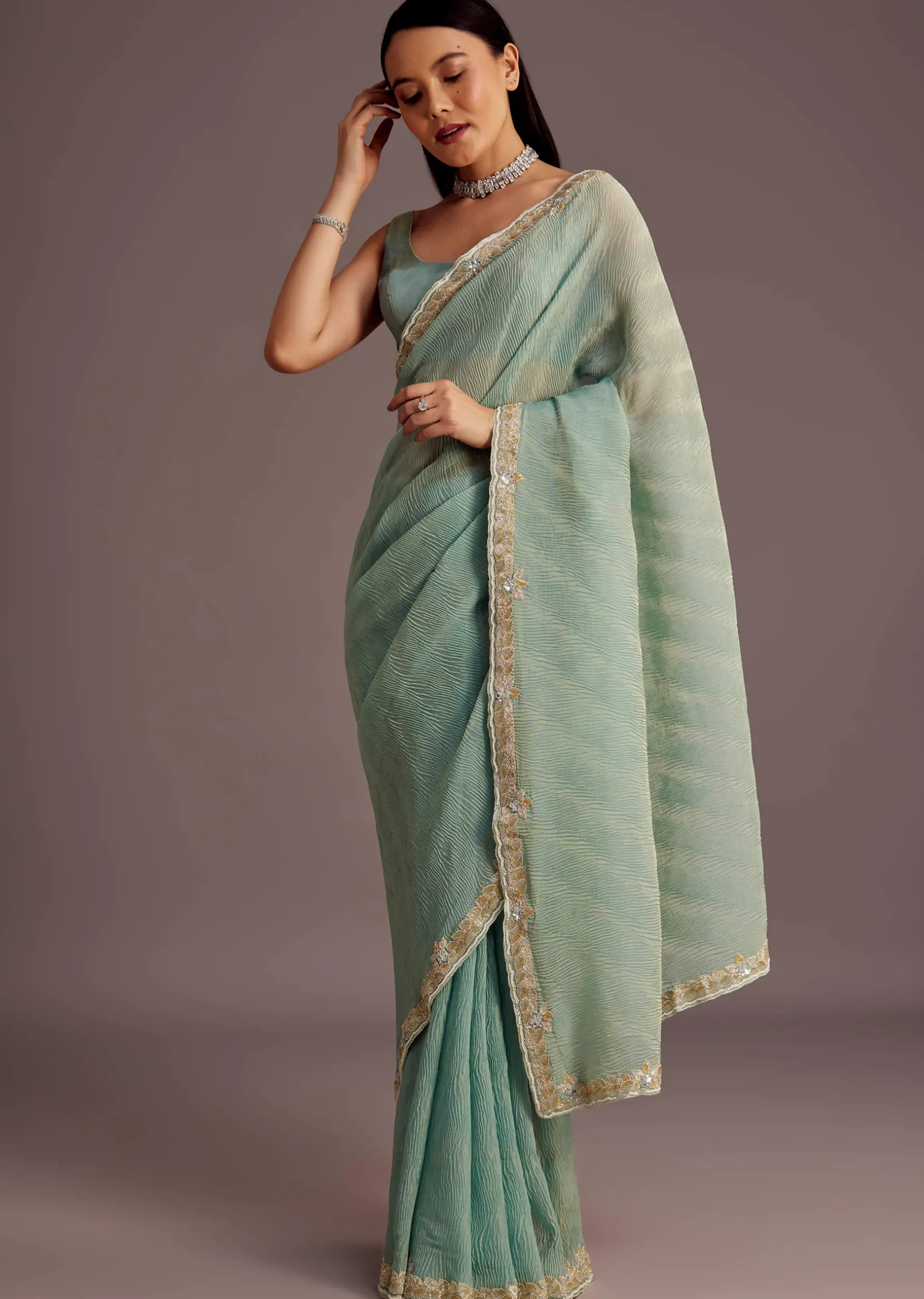 Turquoise Blue Crush Tissue Cutdana Work Saree With Embroidered Border
