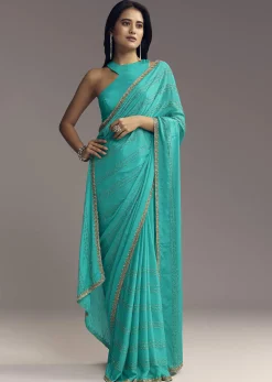 Turquoise Blue Embroidered Chinon Saree With Wavy Border