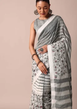 White Cotton Linen Floral Thread Embroidered Saree With Unstitched Blouse Piece