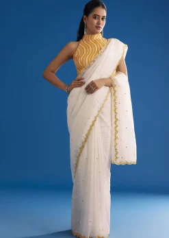 White Crepe Silk Saree With Mirror Scallop Contrast Border And Yellow Blouse