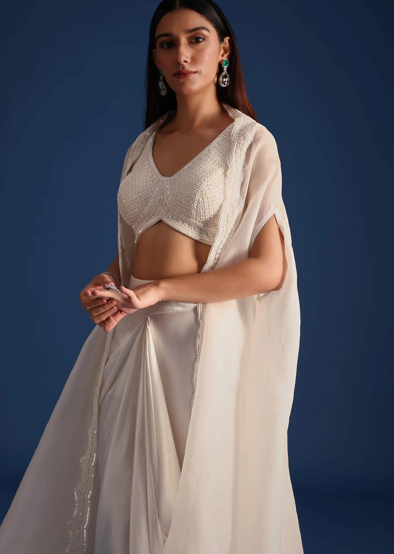 White Jacket With Embellished Blouse And Draped Skirt
