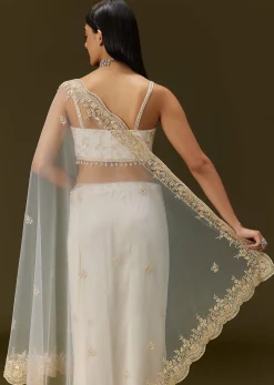 White Net Heavy Embroidered Saree With Embellished Border
