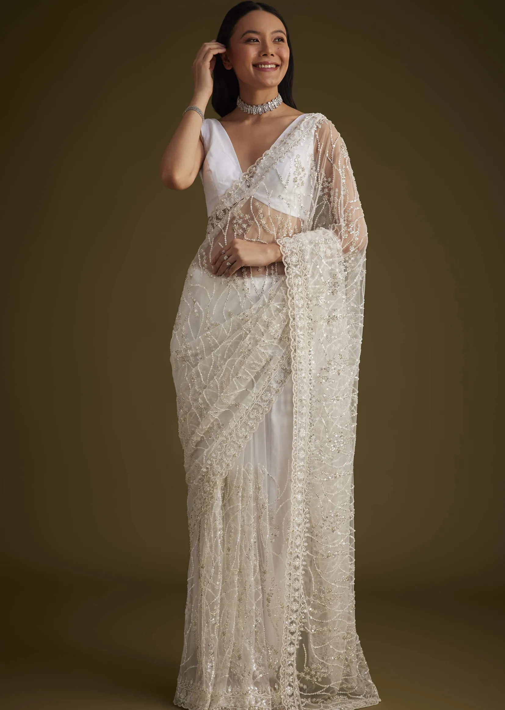 White Net Saree With Sequins And Stones Embroidery