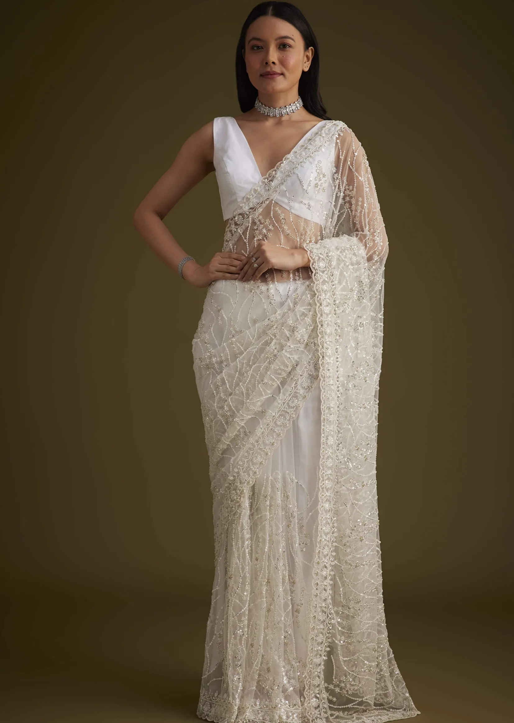 White Net Saree With Sequins And Stones Embroidery