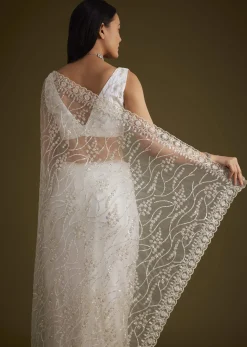 White Net Saree With Sequins And Stones Embroidery