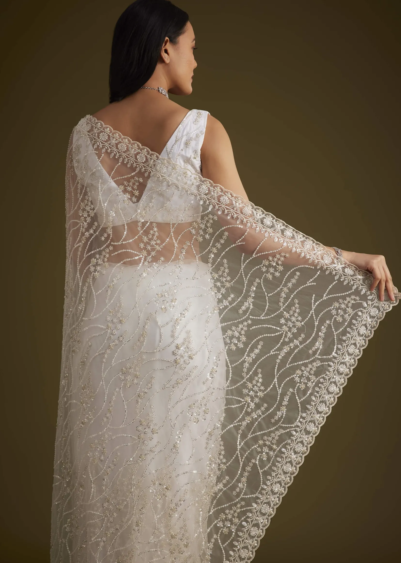 White Net Saree With Sequins And Stones Embroidery