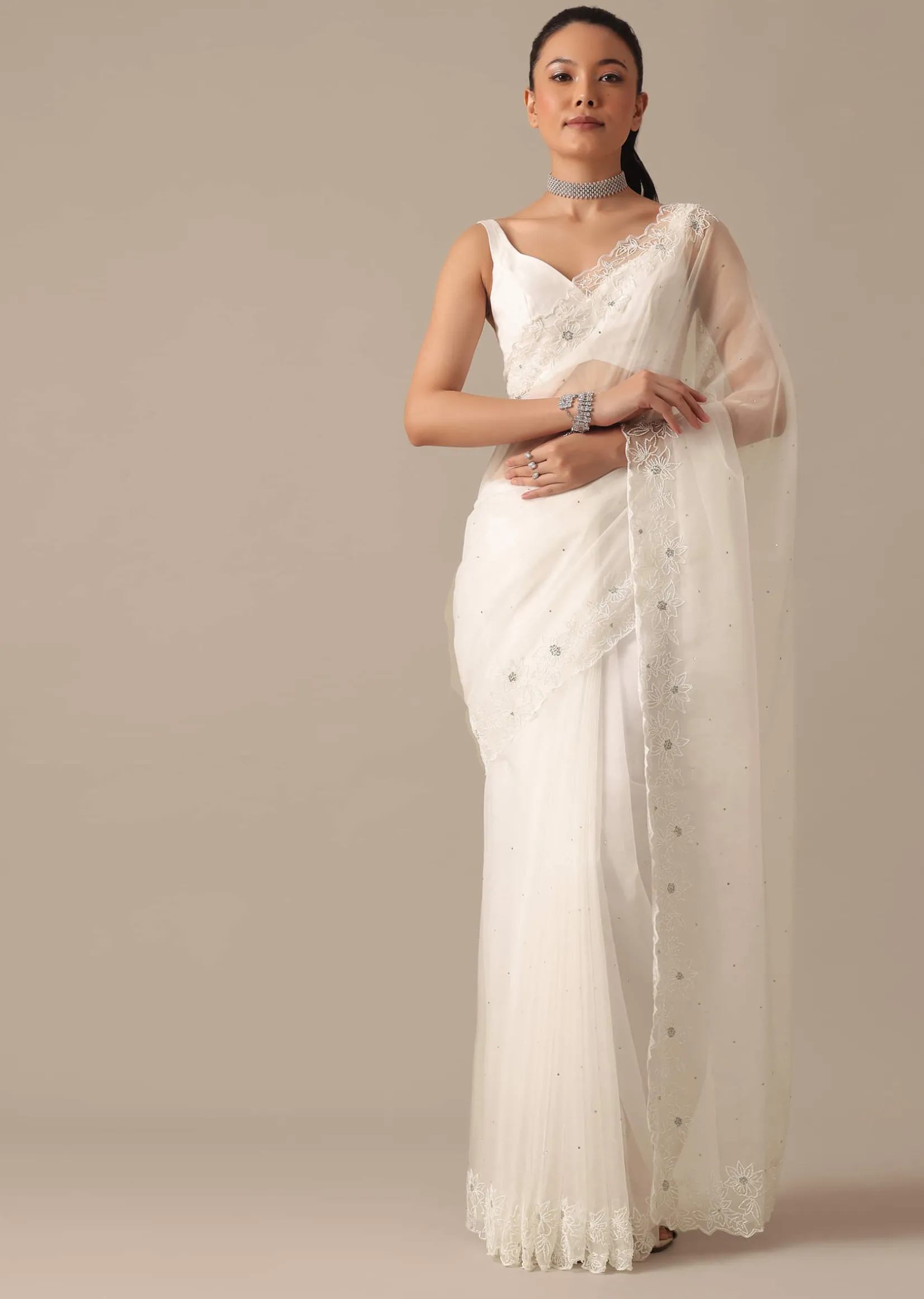 White Organza Saree With Cutdana Work And Unstitched Blouse Piece