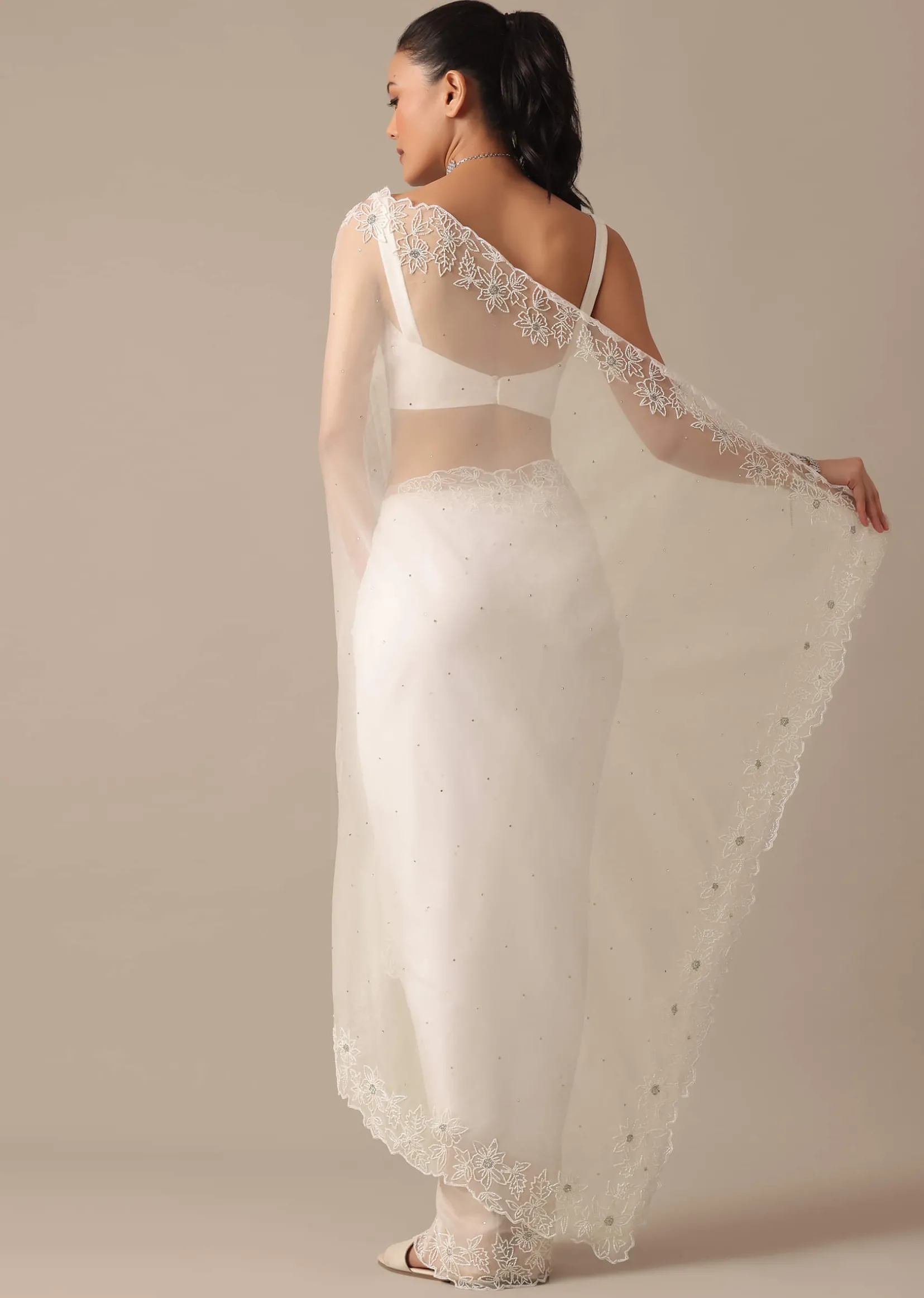 White Organza Saree With Cutdana Work And Unstitched Blouse Piece