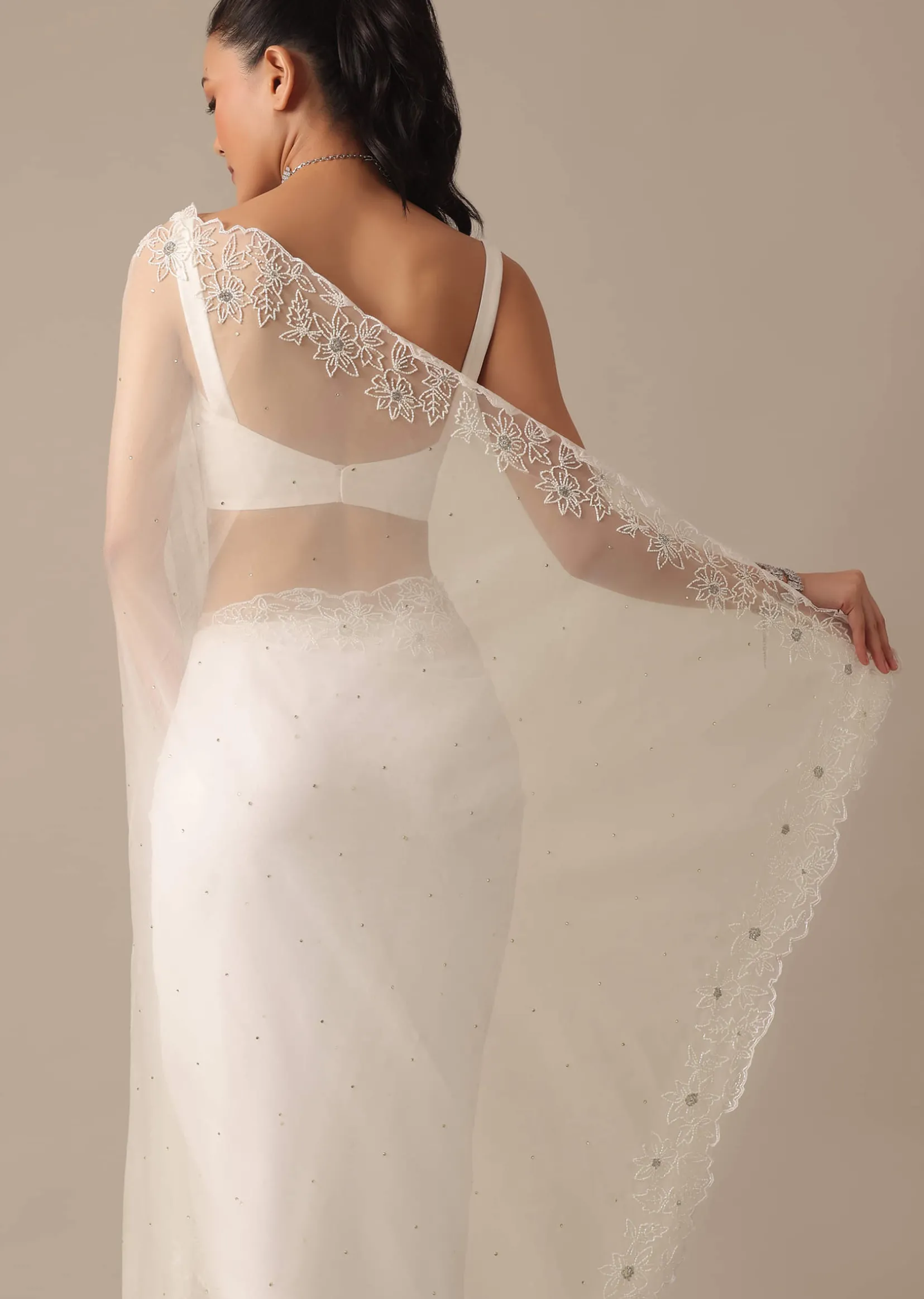 White Organza Saree With Cutdana Work And Unstitched Blouse Piece