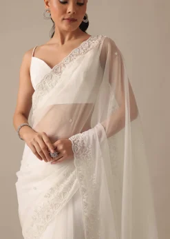 White Organza Saree With Bead Work Border And Unstitched Blouse Piece
